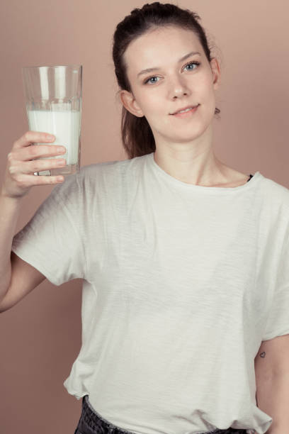 istock cute girl like hate milk 1132782982