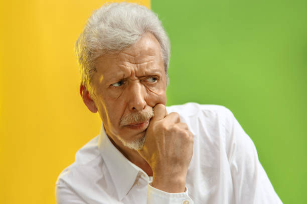 istock serious thoughtful businessman. Doubt concept. 1132785818