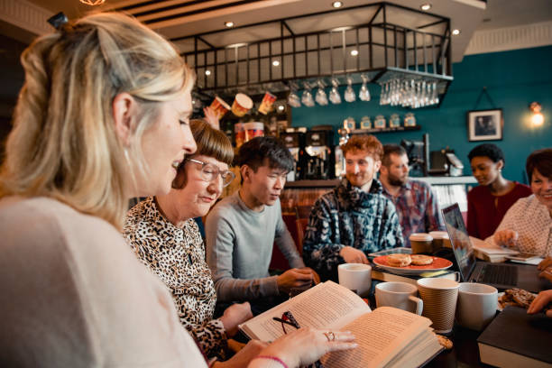 istock Reading in the Book Club Meeting 1132786986
