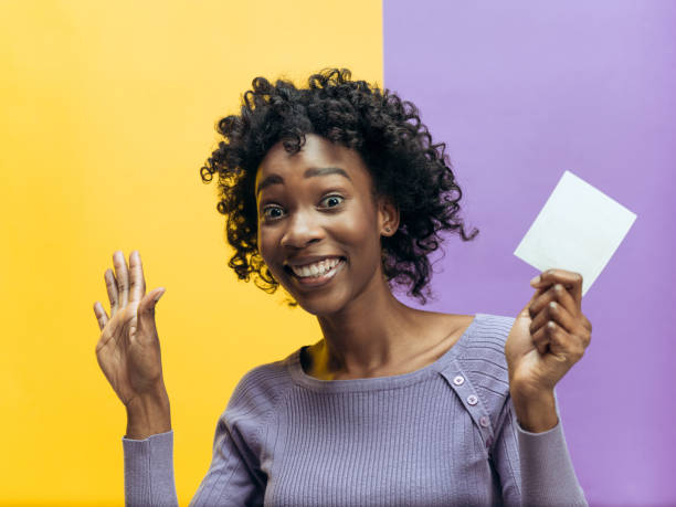 istock Young woman with a surprised expression won a bet 1132787240