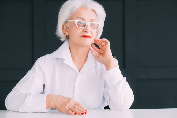 istock thoughtful elderly lady portrait wealthy seniority 1132787365