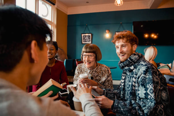 istock Friends Talking in a Book Club 1132787577