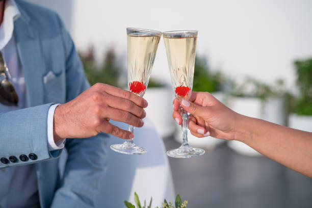 istock detail luxury dinner couple cheering with champagne 1132788545