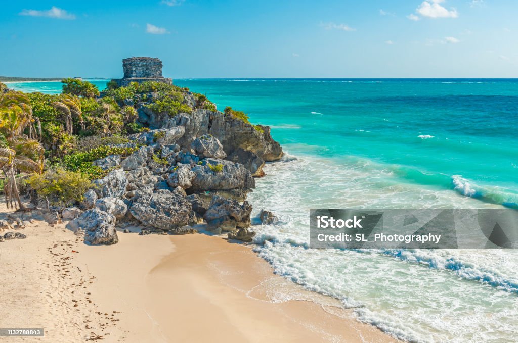 Tulum Beach, Mexico The beautiful beach and Mayan God of Winds temple along the Caribbean Sea, Quintana Roo State, Yucatan Peninsula, Mexico. Tulum - Mexico Stock Photo
