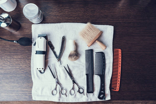 istock Set of different hair cutting tools lying on towel 1132790385