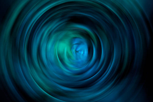 istock Spiral galaxy black hole - Green background 1132791610