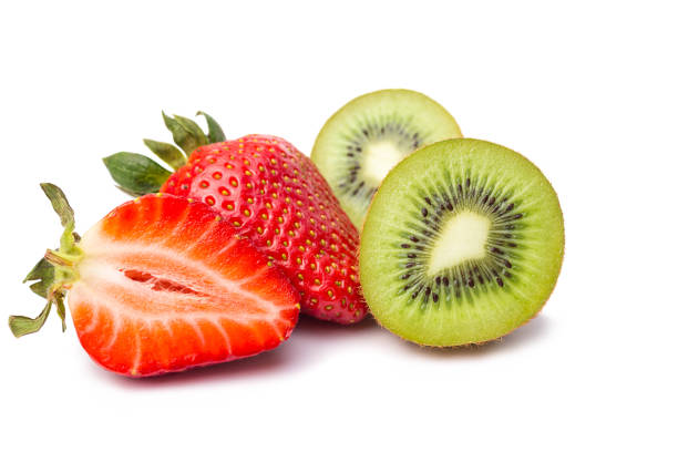 istock Fruit composition of kiwi and strawberries on white 1132795071