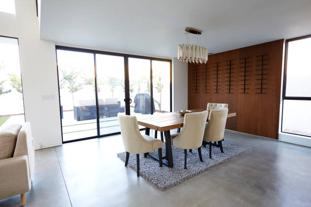 istock Dining Table And Chairs In Stylish And Contemporary Empty Home 1132797378