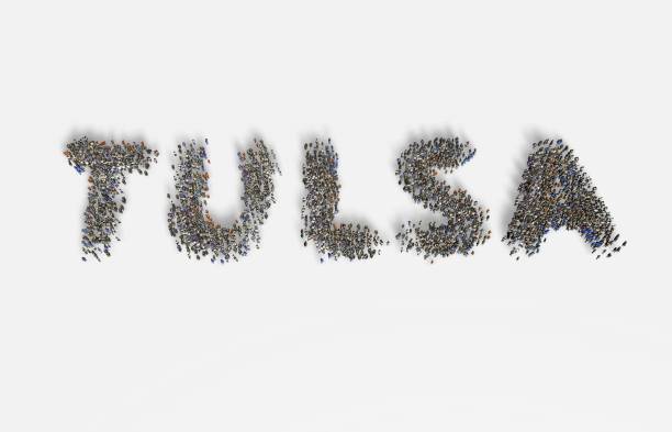 istock Large group of people standing together forming TULSA 1132797706