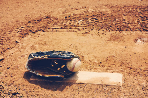 istock Baseball in glove for game on field 1132798090