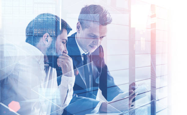 istock Two businessmen in office, skyscraper 1132798291