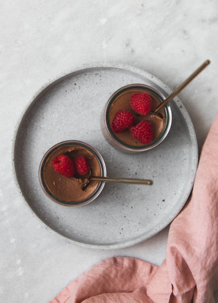istock vegan Chocolate dessert with raspberries on marble background with copy space 1132798868