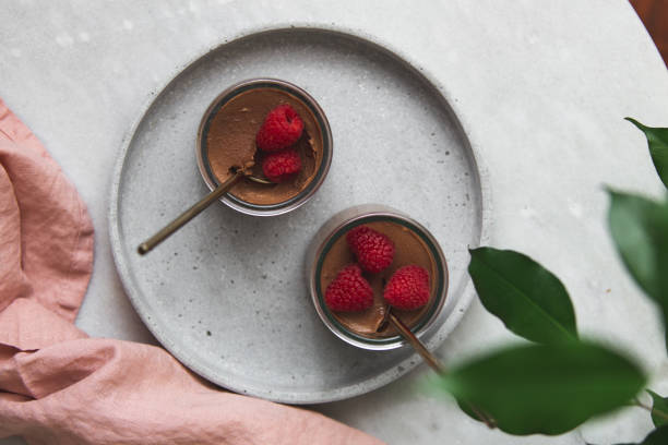 istock vegan Chocolate dessert with raspberries on marble background with copy space 1132798996