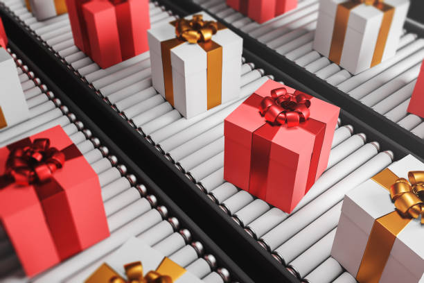 istock White and red gifts on conveyor 1132799042