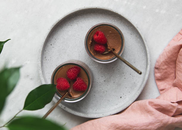 istock vegan Chocolate dessert with raspberries on marble background with copy space 1132799105