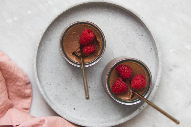 istock vegan Chocolate dessert with raspberries on marble background with copy space 1132799176