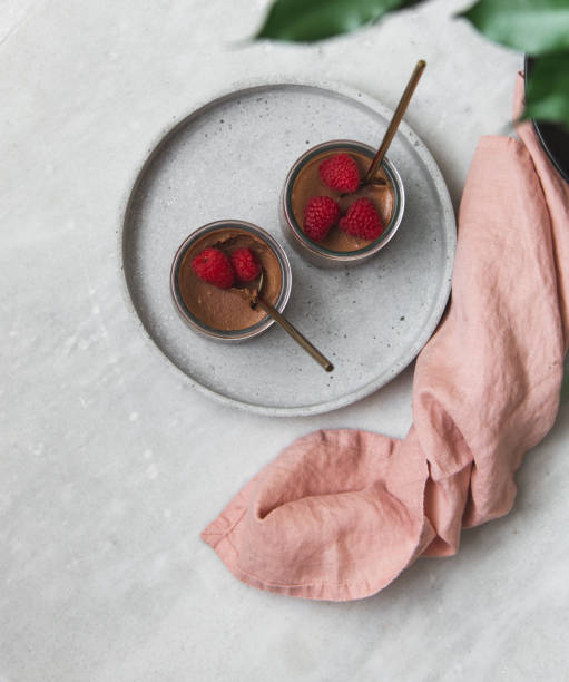 istock vegan Chocolate dessert with raspberries on marble background with copy space 1132799219