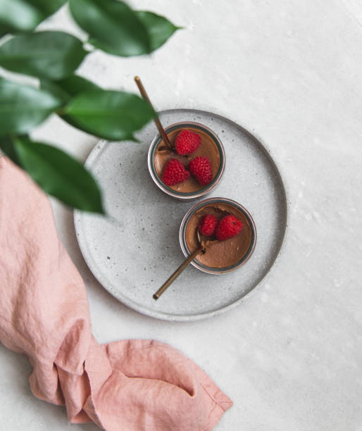 istock vegan Chocolate dessert with raspberries on marble background with copy space 1132799237