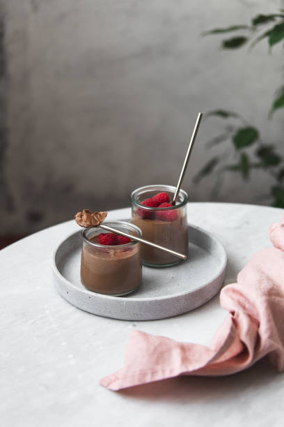 istock vegan Chocolate dessert with raspberries on marble background with copy space 1132799296