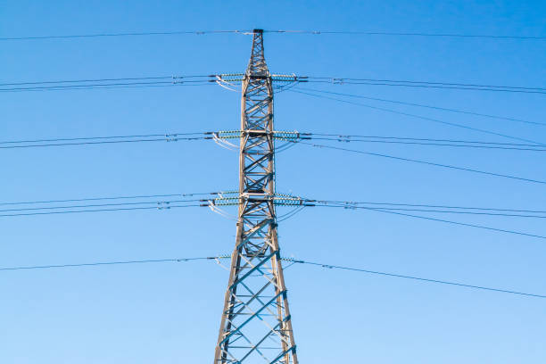 istock High-voltage power line tower on sky background at autumn in Finland. 1132799607