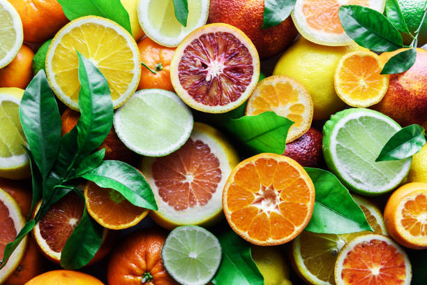 istock Mix of different citrus fruits closeup 1132806908