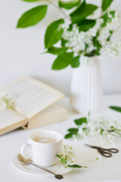 istock Vase with Flowers Bird Cherry Tree, Cup with Coffee 1132808777