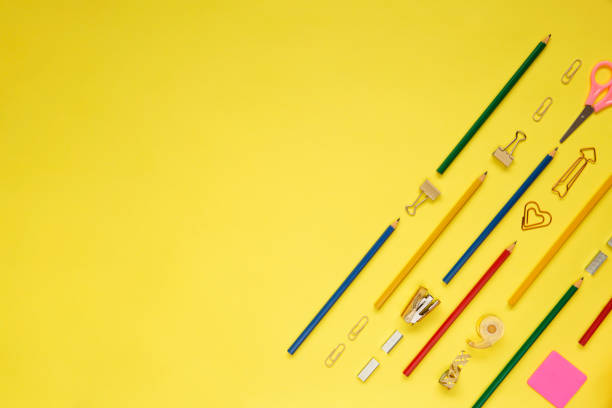istock School supplies and coloring pens flat lay on yellow background 1132809111