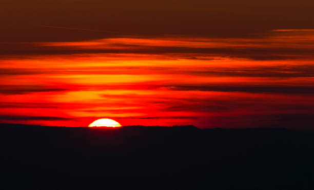 istock Beautiful sunset with colorful clouds 1132809285