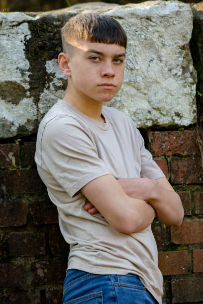 istock Teenage boy outside on a bright Spring day 1132810939