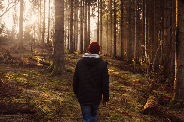 istock Man outdoors walking in spring nature landscape 1132812137