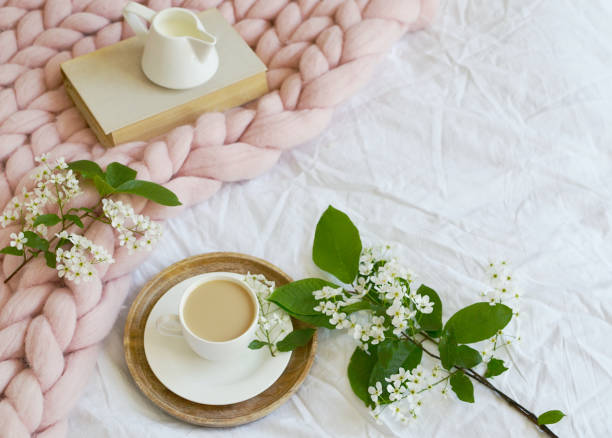 Cup with white coffee, lazy morning concept