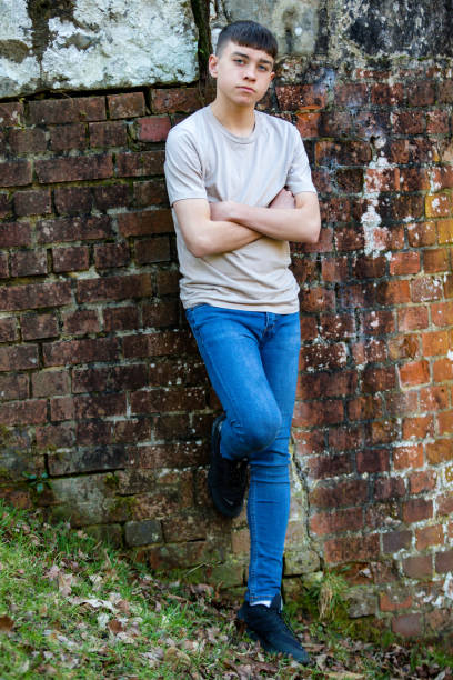 istock Teenage boy outside on a bright Spring day 1132812473