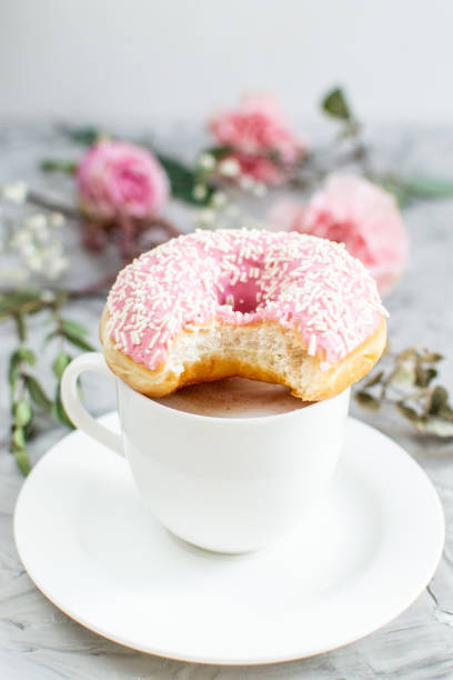 istock Cup with cappuccino, doughnut, morning concept 1132814109