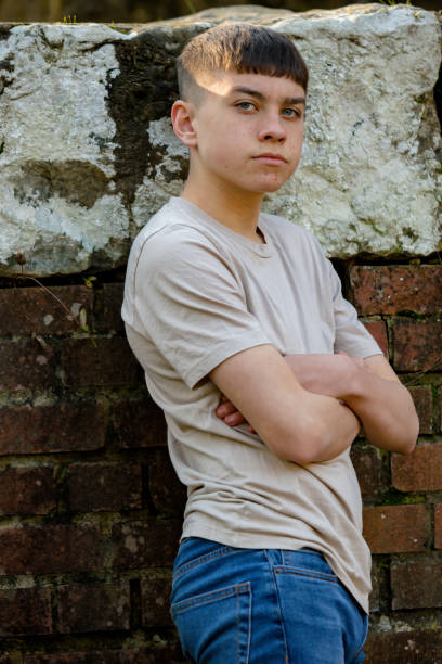 istock Teenage boy outside on a bright Spring day 1132814982