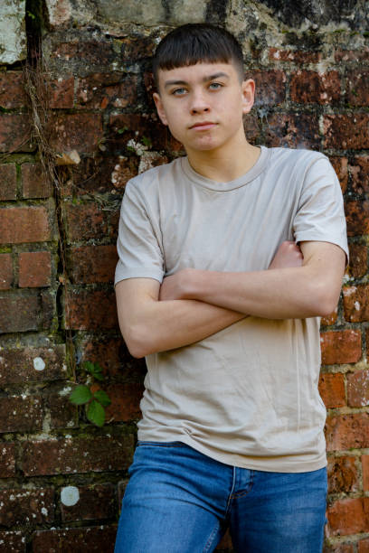 istock Teenage boy outside on a bright Spring day 1132820345