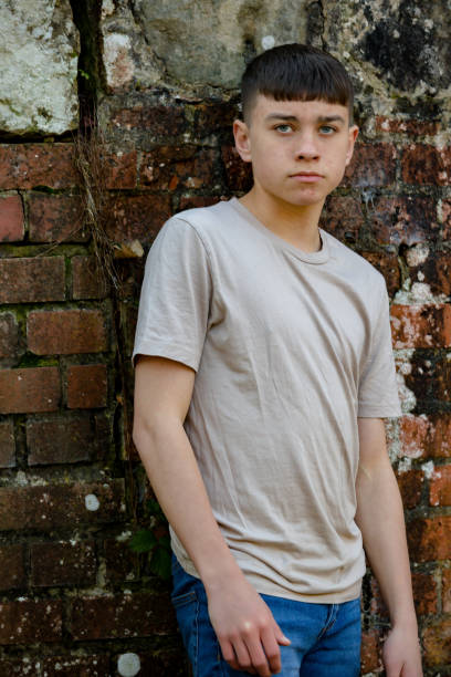 istock Teenage boy outside on a bright Spring day 1132821940
