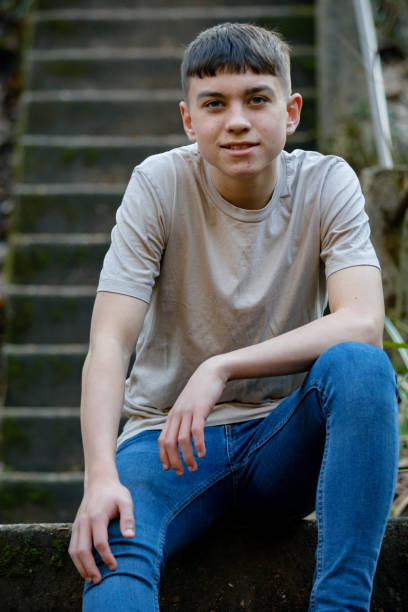 istock Teenage boy outside on a bright Spring day 1132822057