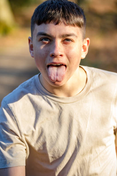 istock Teenage boy outside on a bright Spring day 1132823856