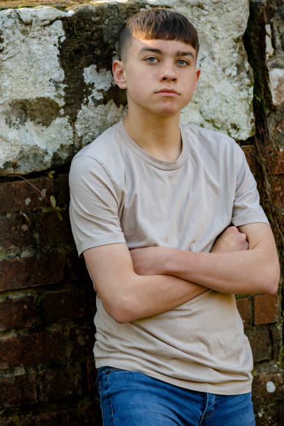 istock Teenage boy outside on a bright Spring day 1132827422