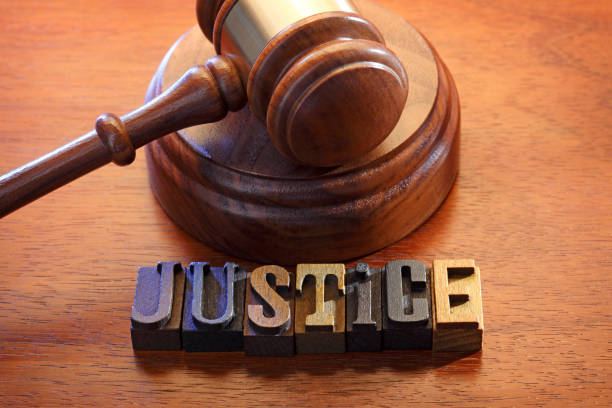 istock Gavel And Letters Spelling Out The Word Justice 1132831083