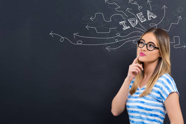 istock Brainstorming idea arrows with young woman 1132831246