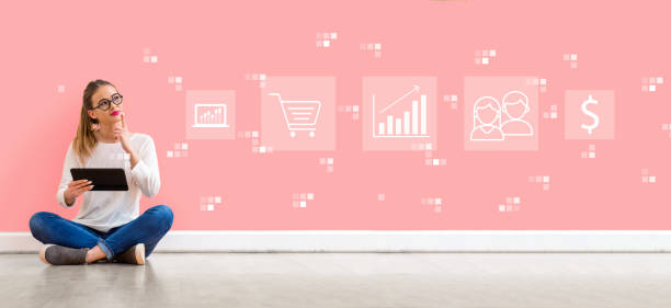 istock Marketing concept with woman using a tablet 1132831284