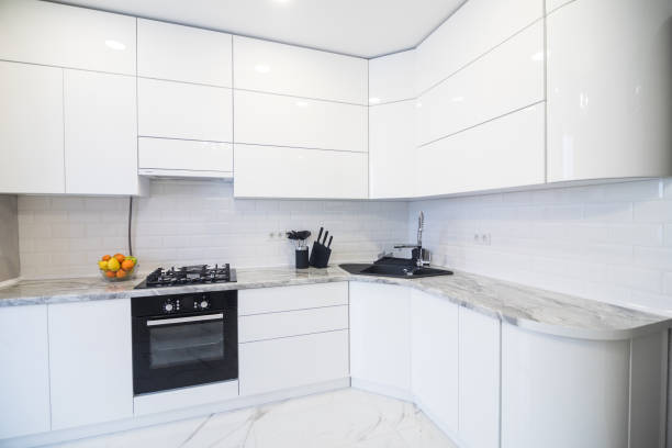 istock New modern minimalistic kitchen with gas cooktop and accesories. 1132833855
