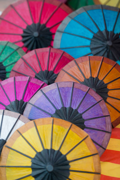 istock LAOS LUANG PRABANG NIGHTMARKET UMBRELLA 1132834451