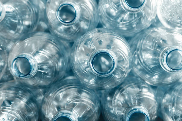 istock Monochrome abstract of a group of water plastic bottles 1132836767