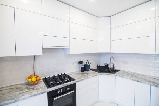 istock New modern minimalistic kitchen with gas cooktop and accesories. 1132837806