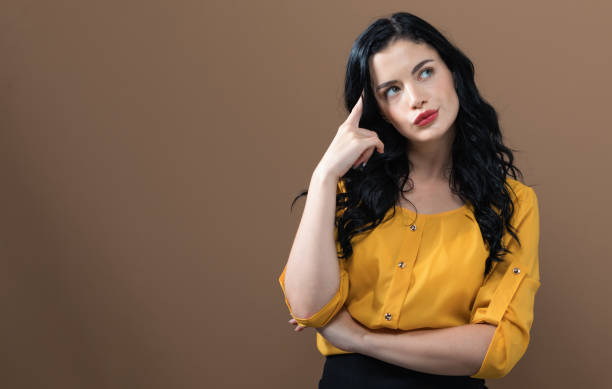 istock Young woman in a thoughtful pose 1132838920