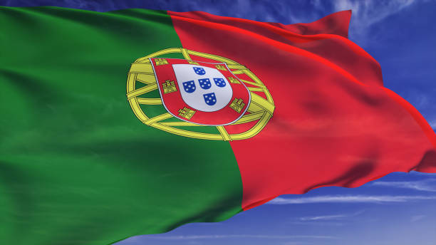 istock flag of Portugal with fabric structure against a cloudy sky 1132839054