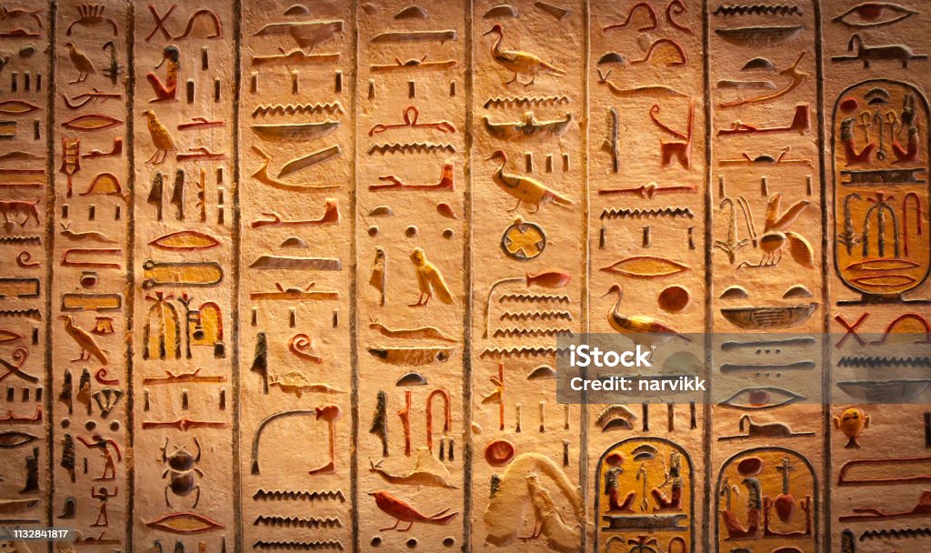 Detail of Egyptian hieroglyphs in Luxor Egyptian hieroglyphs background Hieroglyphics Stock Photo
