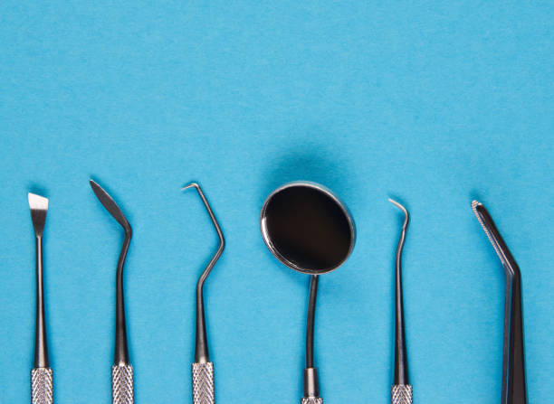 istock Professional Dentist tools in dental office close-up, top view 1132845351